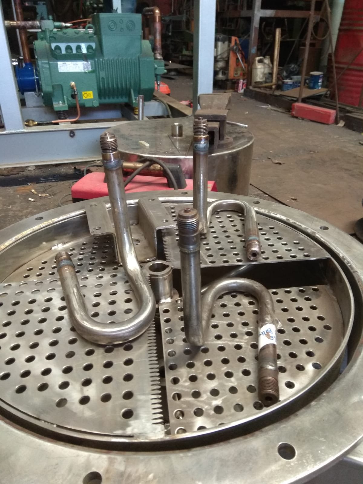 Stainless steel heat exchanger tube assembly and tube sheet