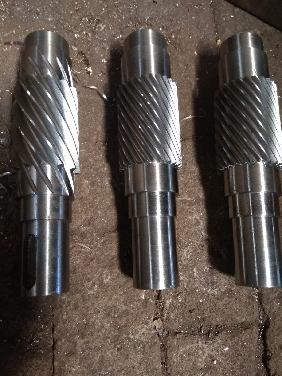 Precision-machined helical gear shafts