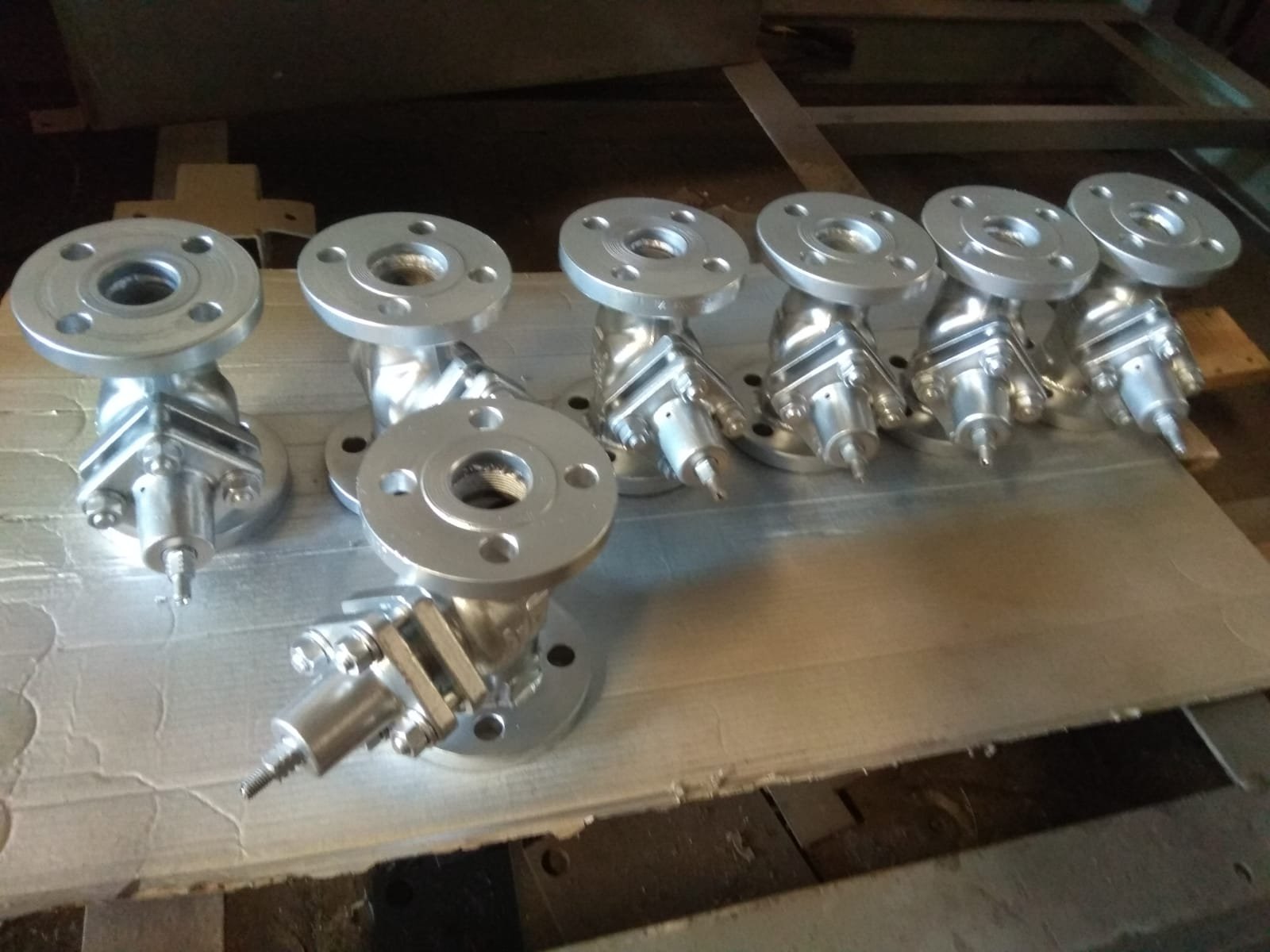 Stainless steel marine utility valve assemblies with machined flanges