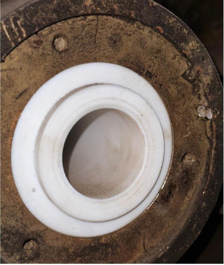 Repaired screw pump component with a white machined liner